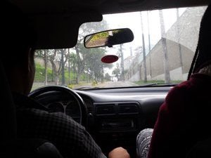 In the taxi, entering Mira Flores area