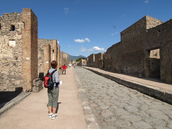 Dot marvelling at the street in Pompeii