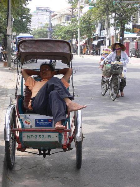 A sleeping cyclo driver
