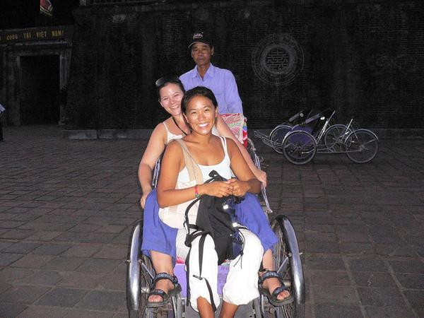 Alex and I piled onto a cyclo....our driver doesn't look too happy at the prospect of peddling us heavyweights around!