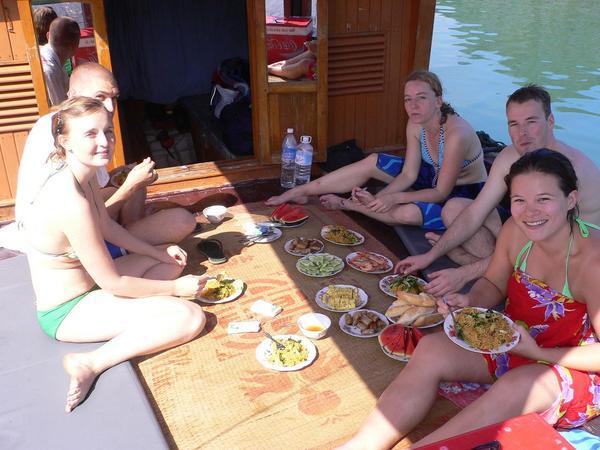 Having lunch on our smaller boat, after swimming