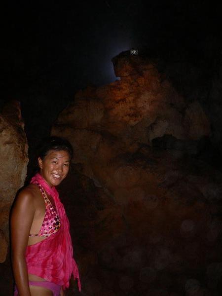 Looking inappropriately dressed in the cave....and standing in mud (yet somehow still smiling)
