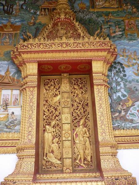 Intricate gold detail on the temple door