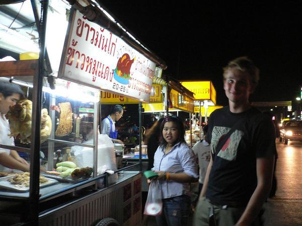 Browsing the food stalls with my friend, Haavard