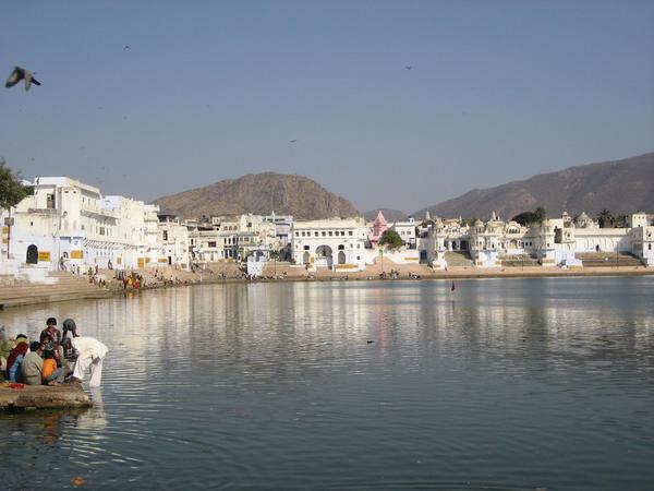 Beautiful whitewashed bathing ghats around the holy lake