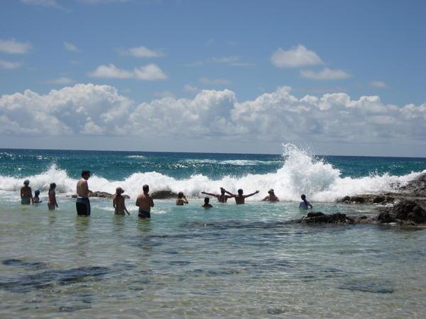Waves crashing over us in the Champagne Pools