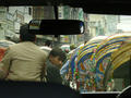 a rickshaw-wallah looking at us!