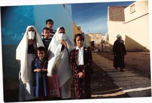 Halima (left) with neighbours and whoever turned up in the photo