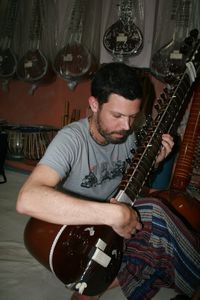 Trying a sitar in small shop... bought it!