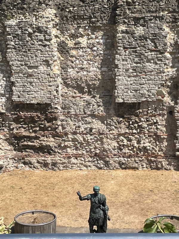 Statue of Roman soldier near the tower