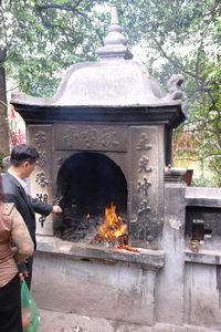 Burning Money for the Ancestors at the Lake Hanoi