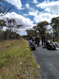 Angry bikies at the stop and slow sign