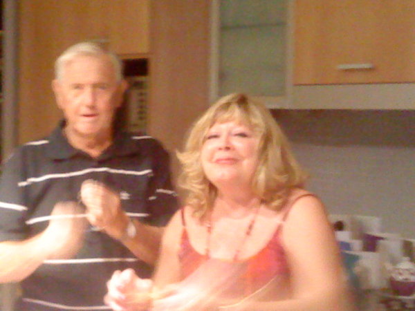 pam & john hamming it up, in the kitchen