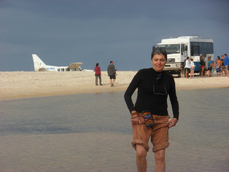 tess with plane & bus on beach