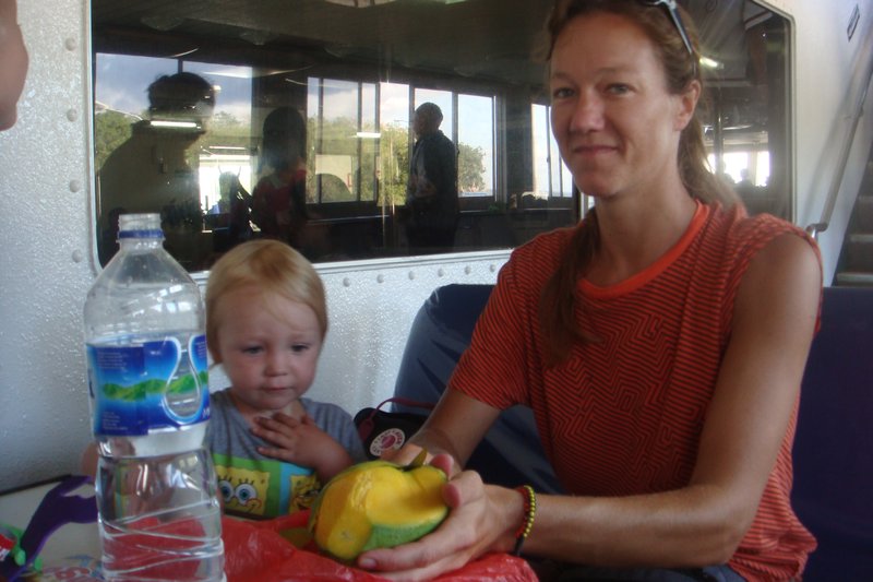preparing mango on the ferry 