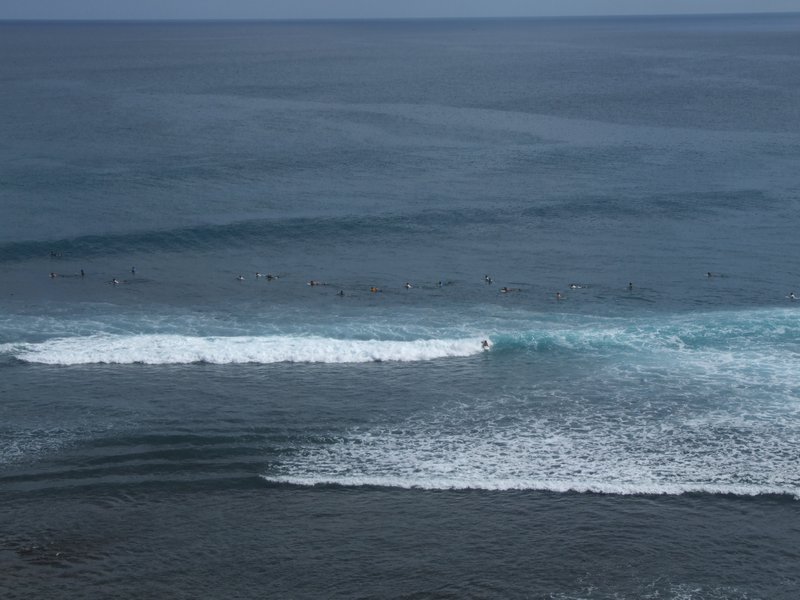 Surfers at Uluwatu beach 