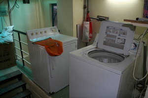 One washer weighs over 50kg, the other around 150g