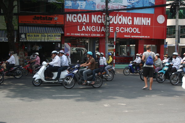 Ash negotiating traffic in Saigon