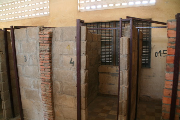 Cells at the former school turned processing centre