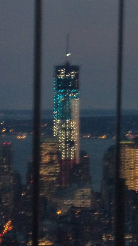 The new World Trade Centre lit up in red, white and blue