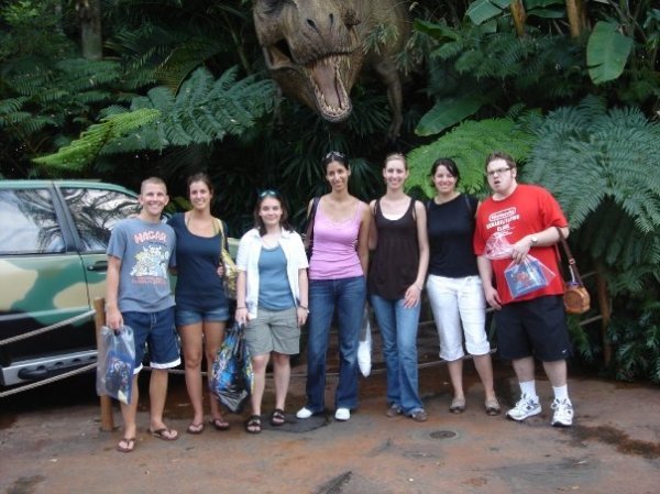 In front of the Jurassic Park dinosaur