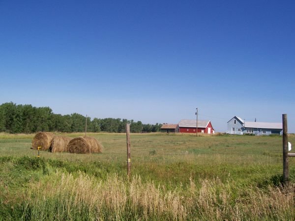 a barn/bails of hay scene