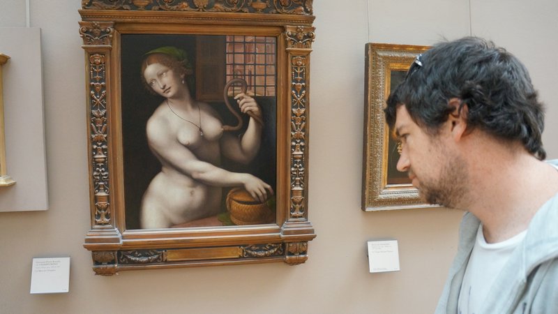 Abe enjoying one of the many art works at The Louvre