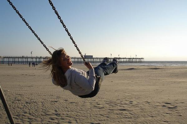 Pismo Beach - Jo on the swings