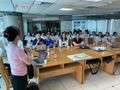 Dr. Liu translating case presentations