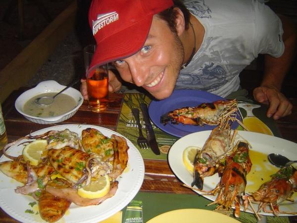 Chris delighted by seafood.