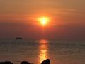 Sunrise over Lake Malawi with the Ilala ferry