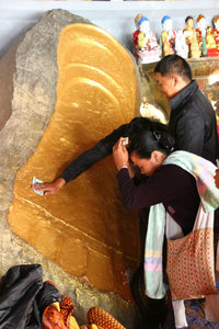 get blessing from buddha footprint