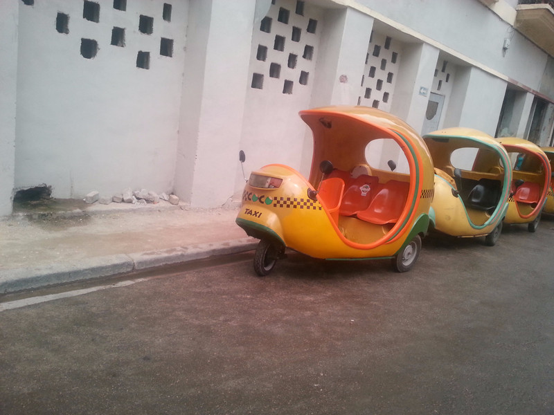 Coco taxis outside of La Floridita