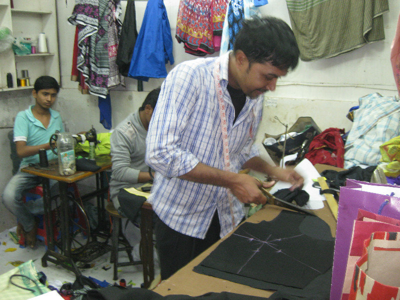 Busy and tired tailor