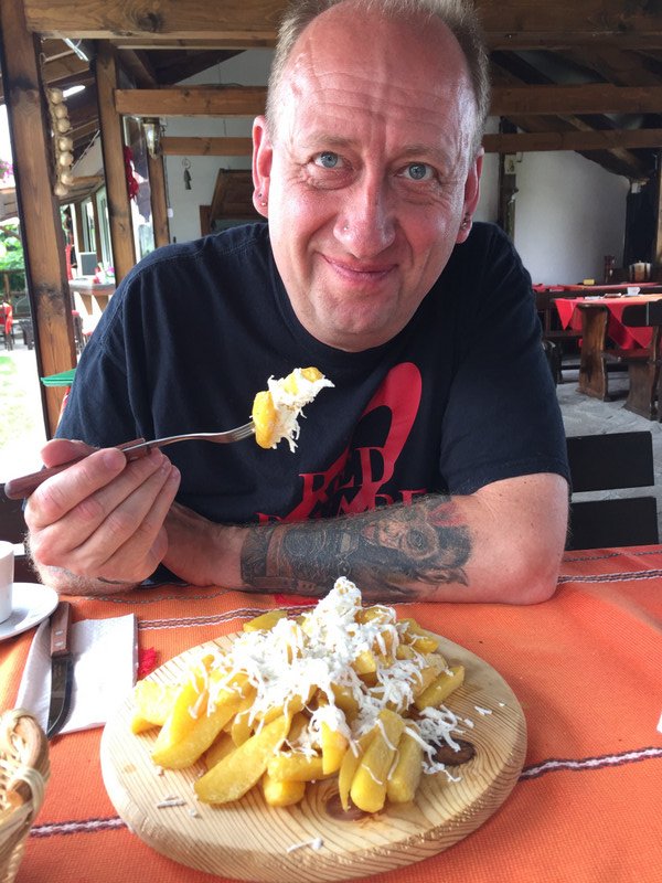 Hubby eating cheesy chips Bulgarian style