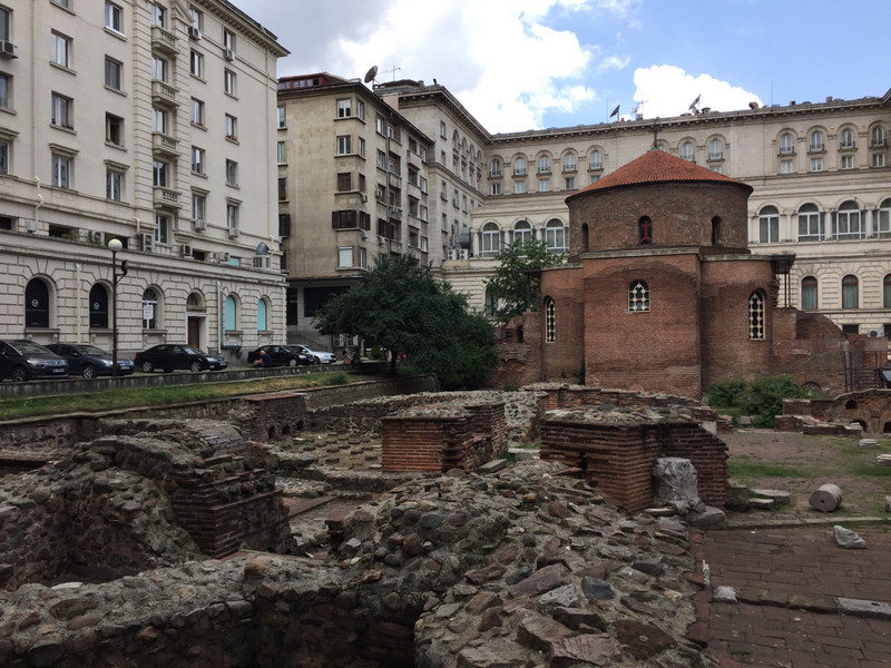Rotunda of Sveti Georgi surrounded by communist buildings