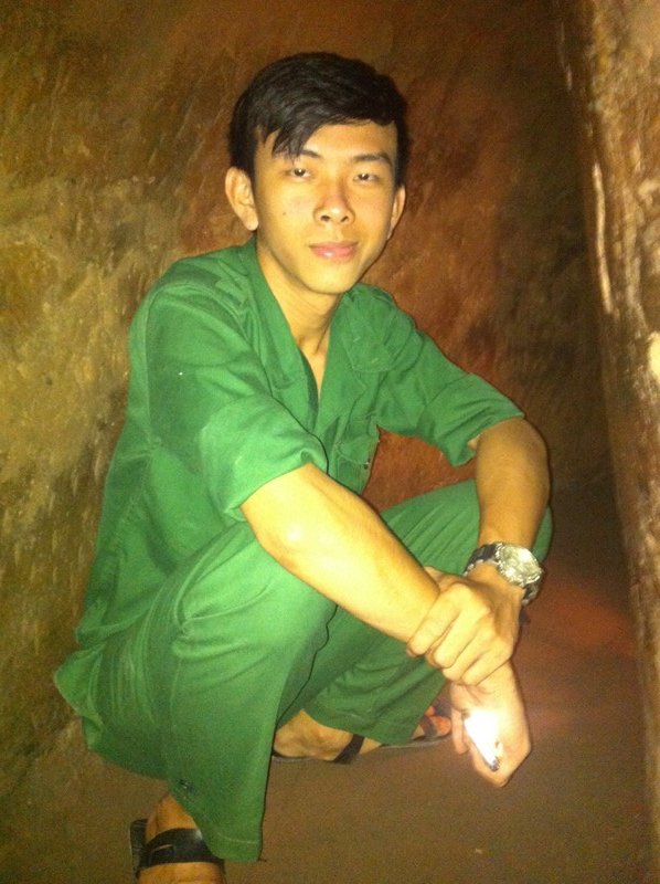 Guide in a Cu Chi tunnel