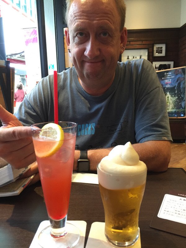 Hubby with fruit cocktail and my frozen beer