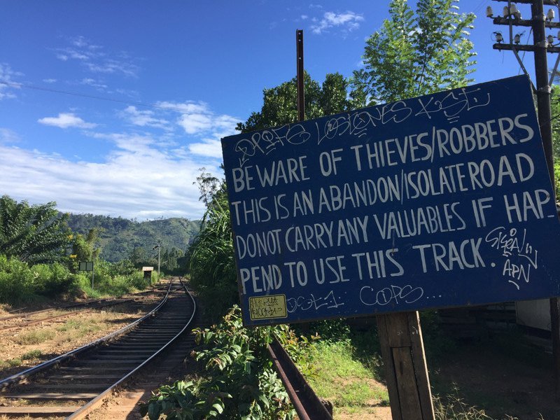 Warning signs on rail track near Ella