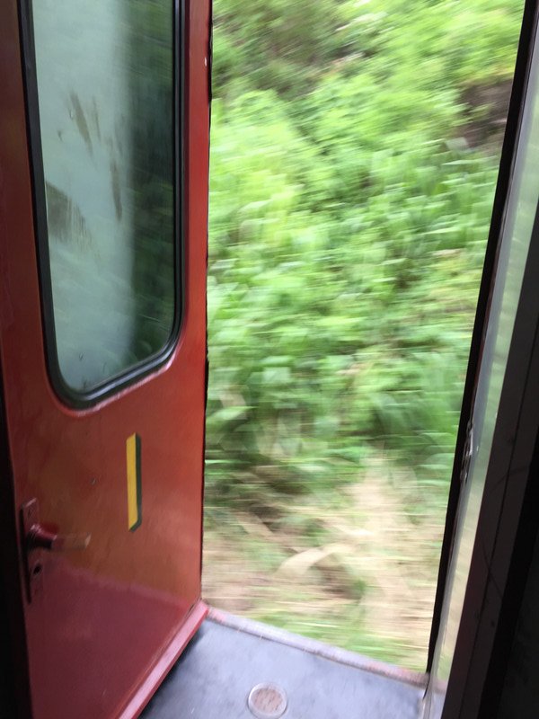 Open doors on moving train