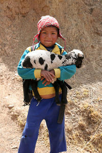 Pisac local and his little lamb