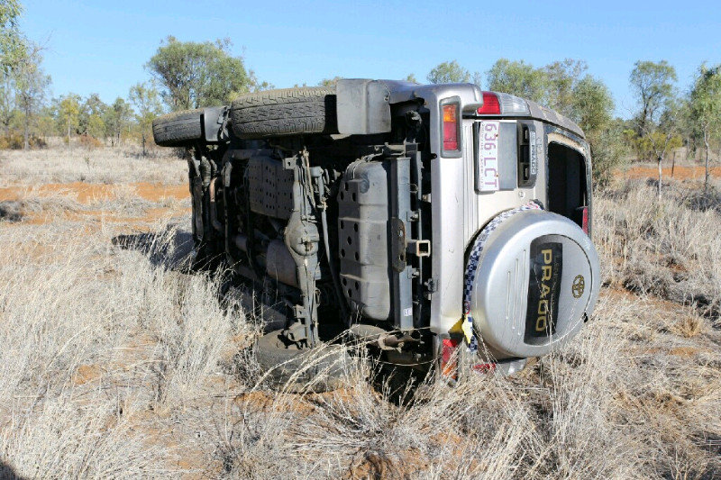 Day 19 - Came across this 4WD on it's side just off the highway in the bush.