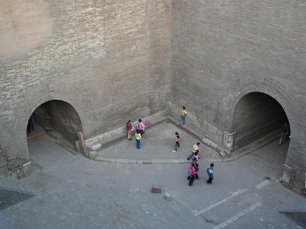Children play in one of the gates