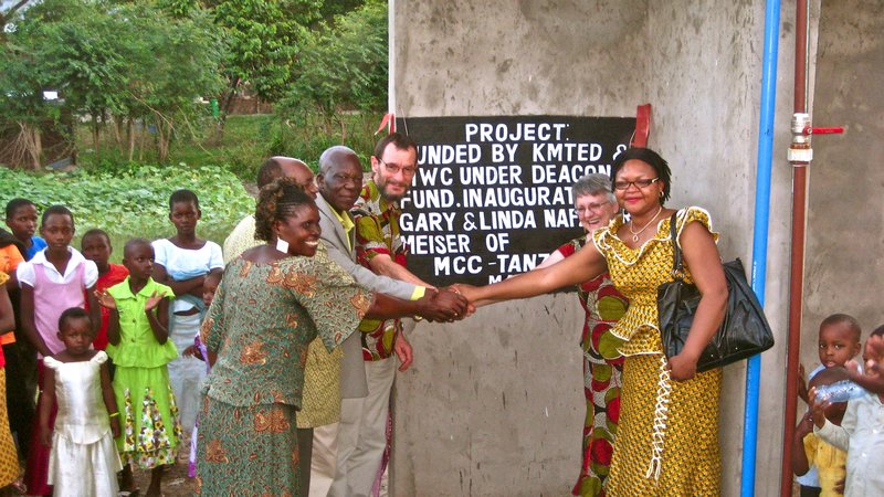 The opening of the new community water project/plan.