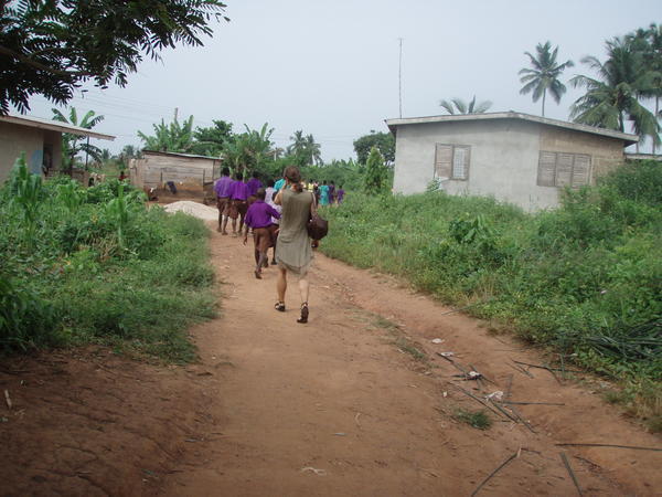 Walking to the sports ground at Obuasi