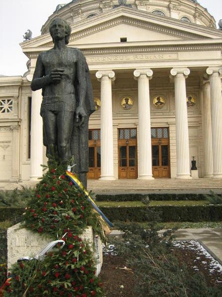 Statue outside the Romanian Athenaeum, the city's main concert hall.