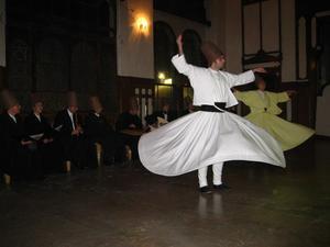 Whirling Dervishes and band in the background