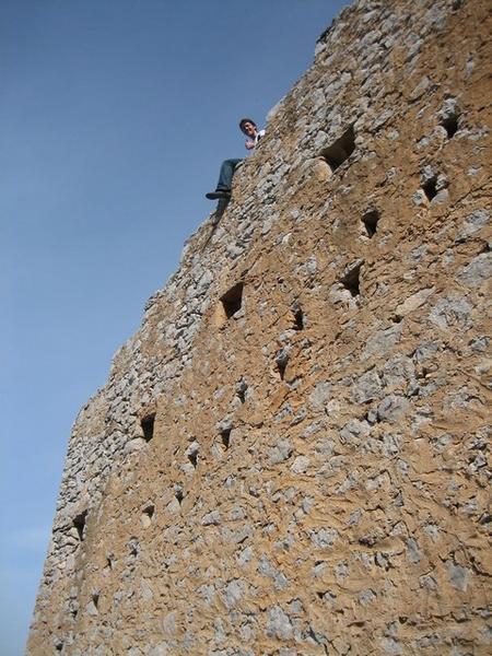 Joel scaring me by sitting on the edge of the fortress walls!