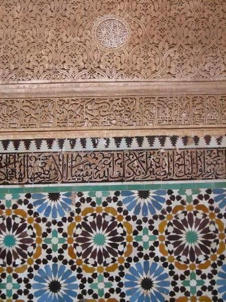 Intricate designs on the walls in the medersa