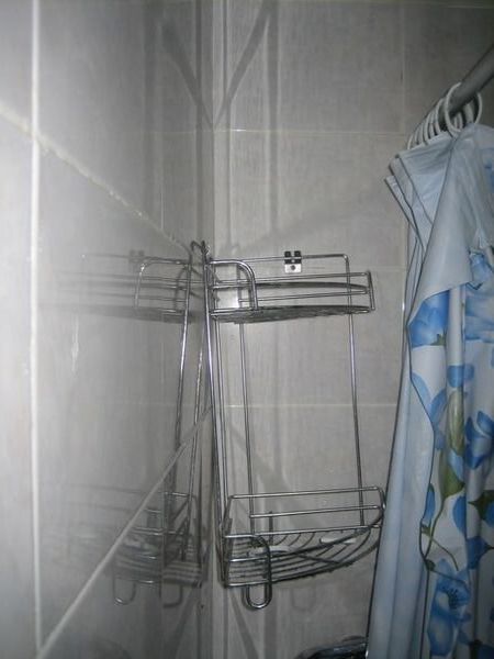 Shower recess in our cheap hotel in Singapore!